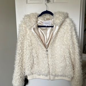 Fuzzy jacket with satin lining.